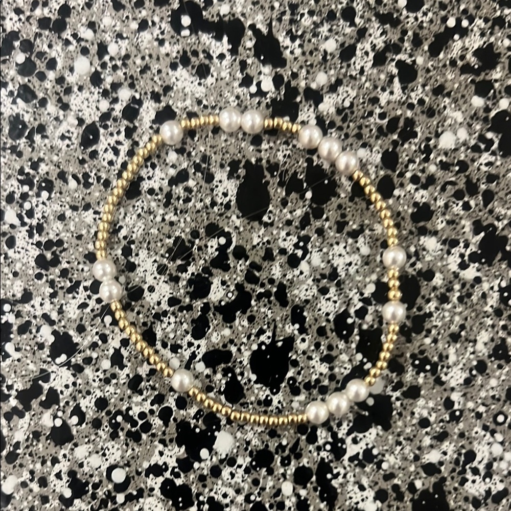 Elegant Enewton Gold and White Beaded Bracelet